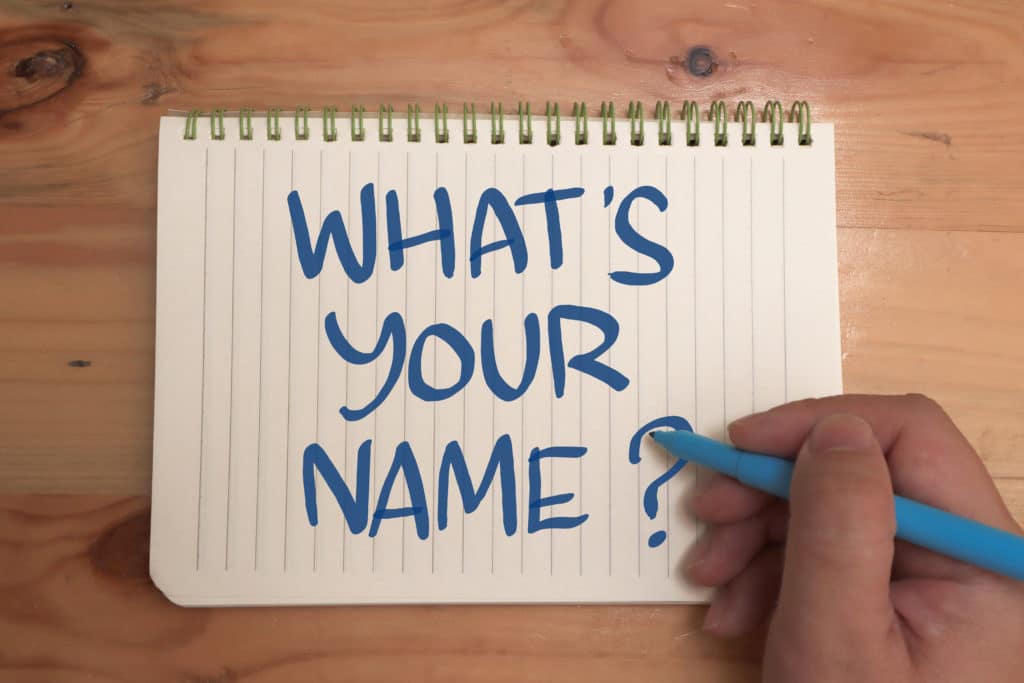 "what's your name" written on note pad