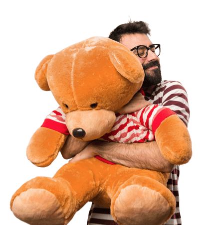 man hugging a giant teddy bear after creating a company name
